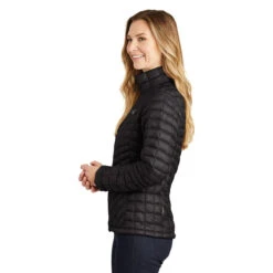 The North Face Women's TNF Matte Black Thermoball Trekker Jacket -Sportswear Shop NF0A3LHK TNFMatteBk model side